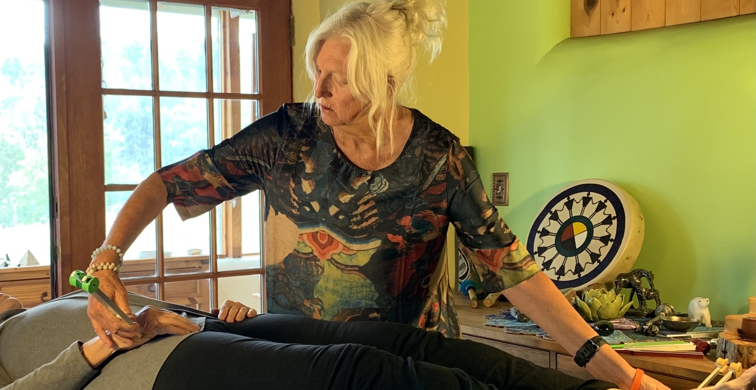 Donna Carey demonstrates Acutonics tuning fork technique